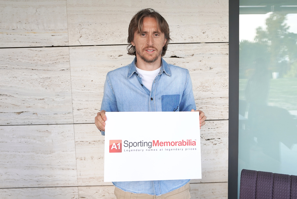 Luka Modrić signs for A1 Sporting Memorabilia on 14th March 2024 in Madrid, Spain.
