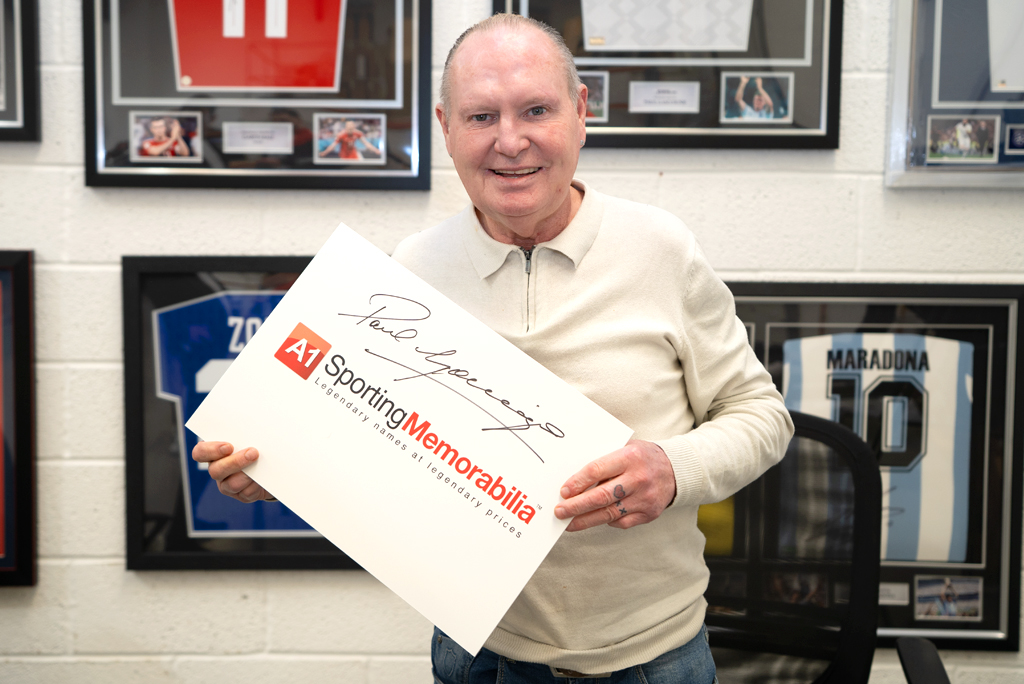 Paul Gascoigne signs with A1 Sporting Memorabilia on 29th April 2024 in Christchurch, UK.