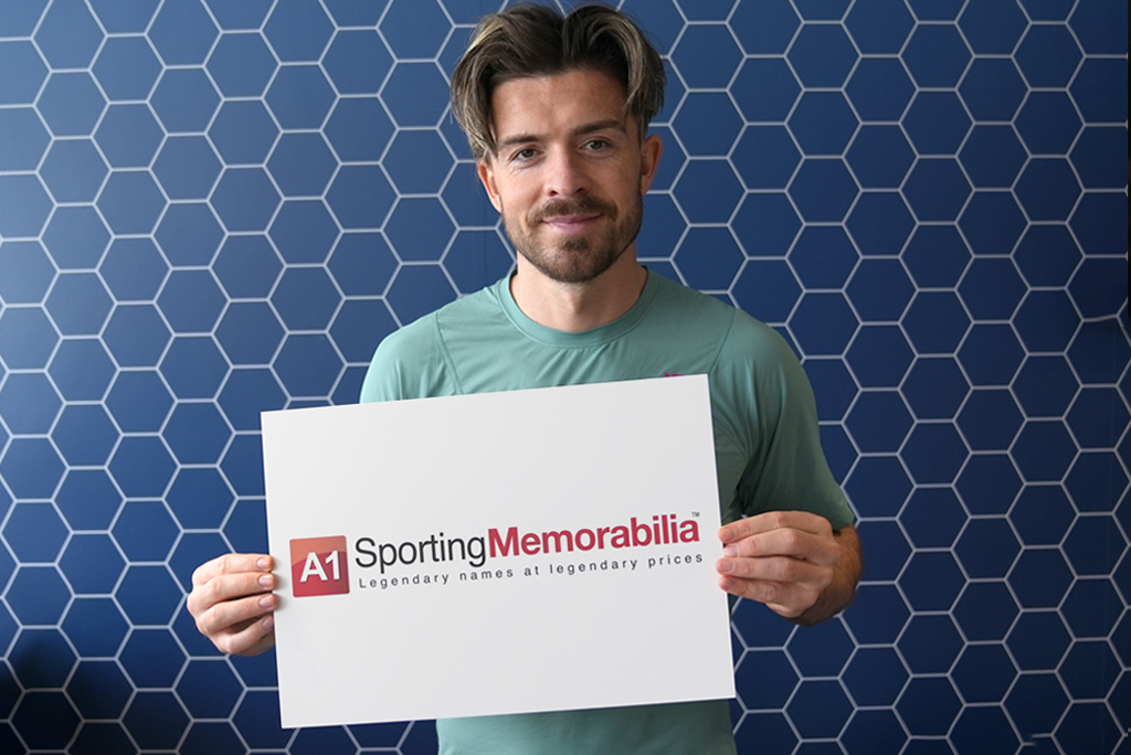 Jack Grealish signs for A1 Sporting Memorabilia on 4th April 2024 in Manchester, UK.