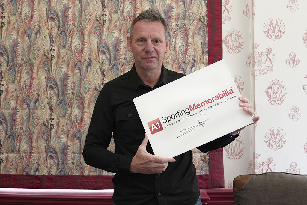 Stuart Pearce signs for A1 Sporting Memorabilia on 11th June 2024 in Watford, UK.