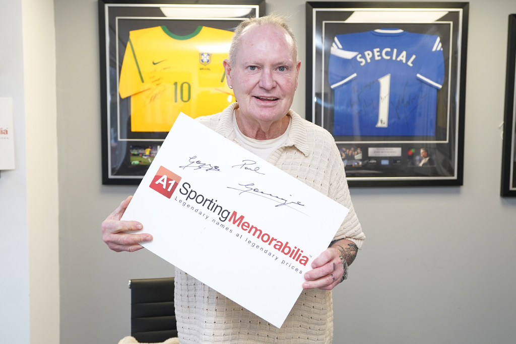Paul Gascoigne signs with A1 Sporting Memorabilia on 11th December 2024 in Christchurch, UK.