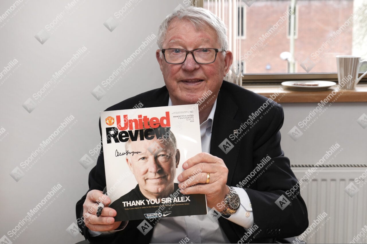 Sir Alex Ferguson signs for A1 Sporting Memorabilia on the 12th February 2025 in Manchester, UK.