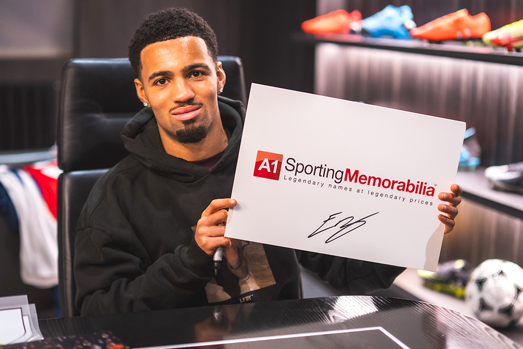 Ethan Nwaneri signs with A1 Sporting Memorabilia on the 3rd November 2025, in London, UK.